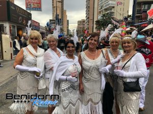 Benidorm fancy dress party with girls in dresses